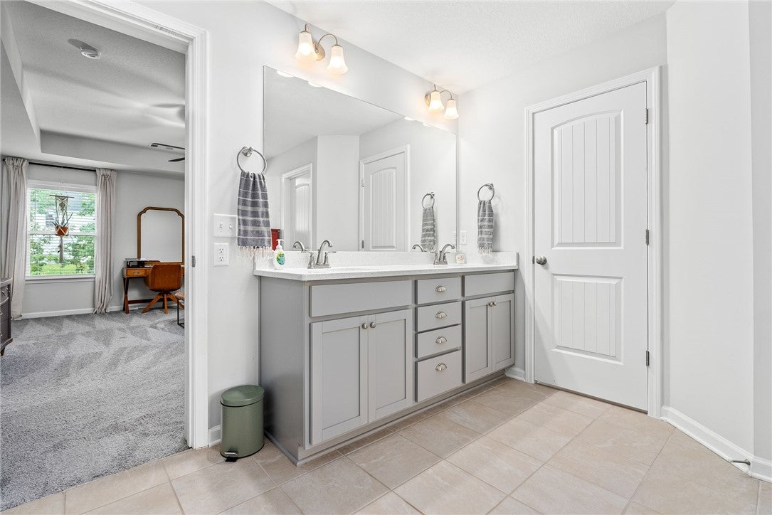 1883 Waterfall Road Auburn, AL 36830 - Photo 24 of 37 Large main bathroom has a double vanity and separate water closet