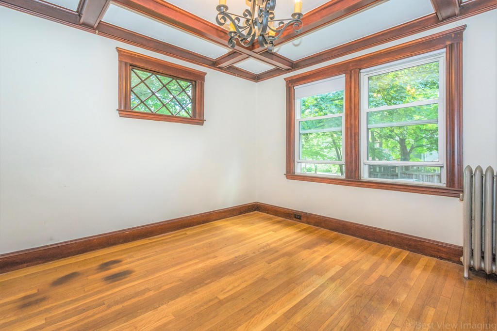 59-61 Brington Road Brookline, MA 02445 - Photo 14 of 19 a view of empty room with window