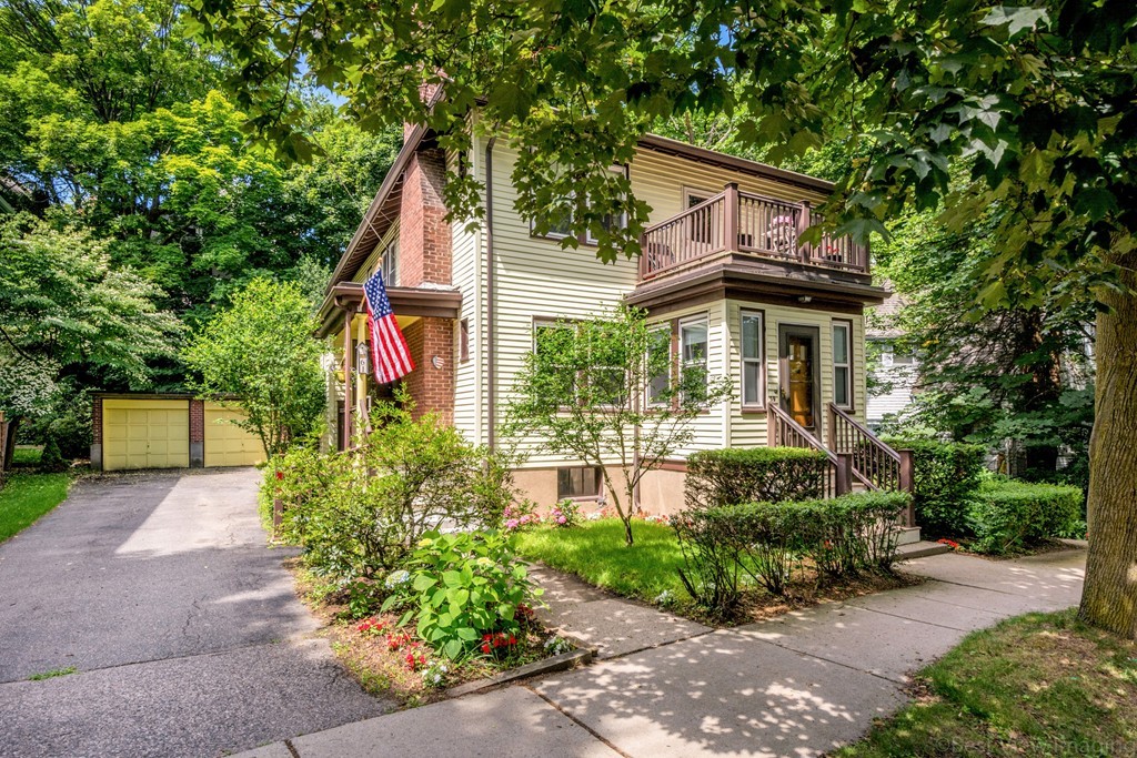 59-61 Brington Road Brookline, MA 02445 - Photo 19 of 19 a front view of a house with garden
