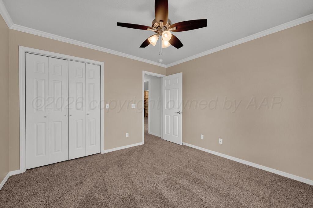19933 Indian Spring Trail Bushland, TX 79124 - Photo 27 of 32 an empty room with chandelier fan