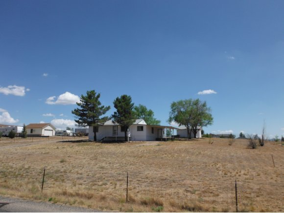 2125 W Road Chino Valley, AZ 86323 - Photo 18 of 20 a view of a street with a cars parked