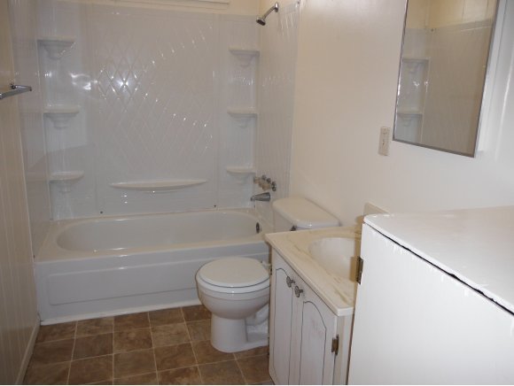 2125 W Road Chino Valley, AZ 86323 - Photo 9 of 20 a bathroom with a sink a toilet and shower