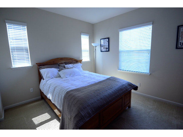 3102 Browntail Way San Ramon, CA 94582 - Photo 8 of 12 a bedroom with a bed and a window