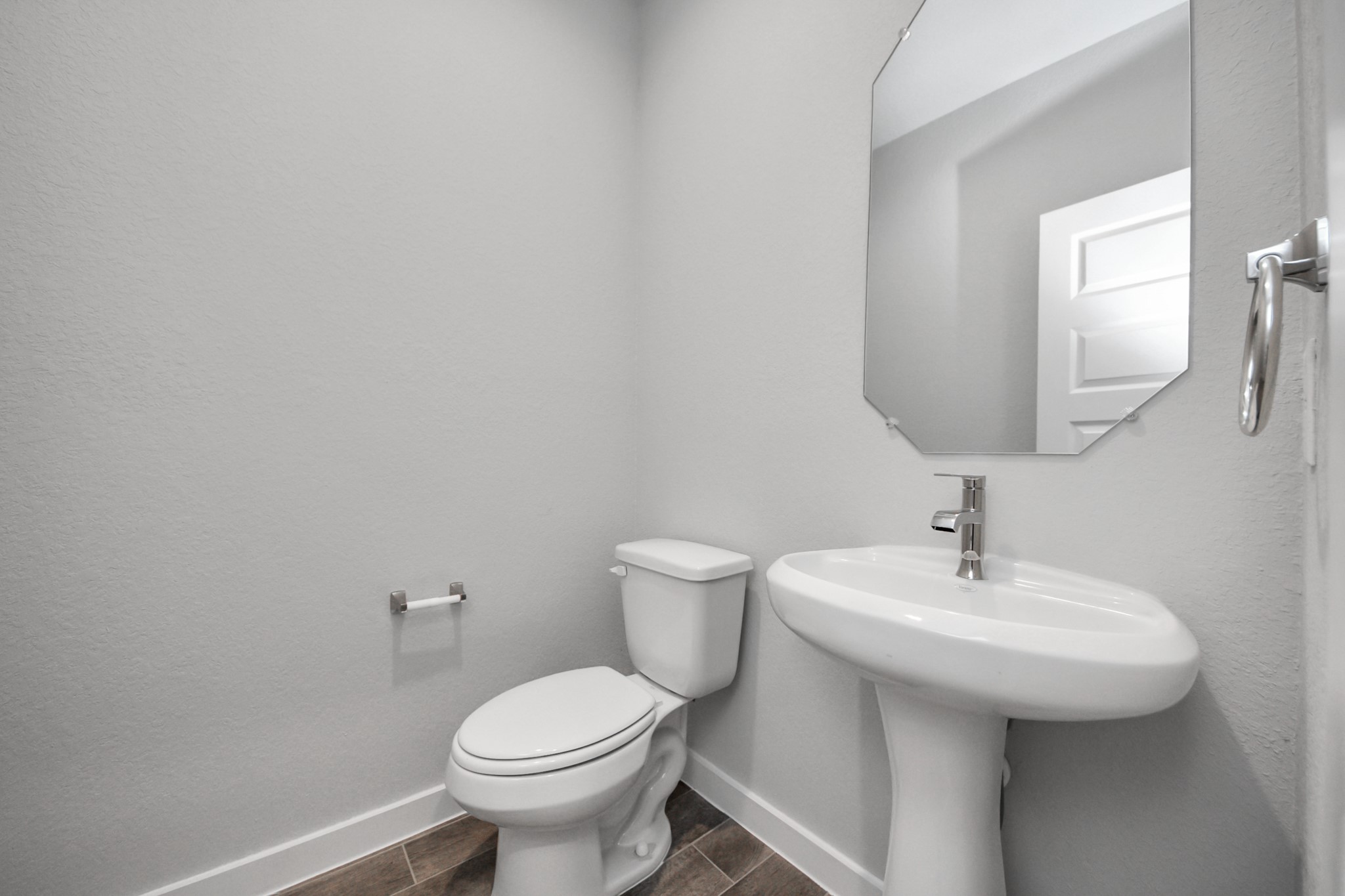3002 Bury Park Dr Spring Spring, TX 77373 - Photo 7 of 45 a bathroom with a sink toilet and a mirror