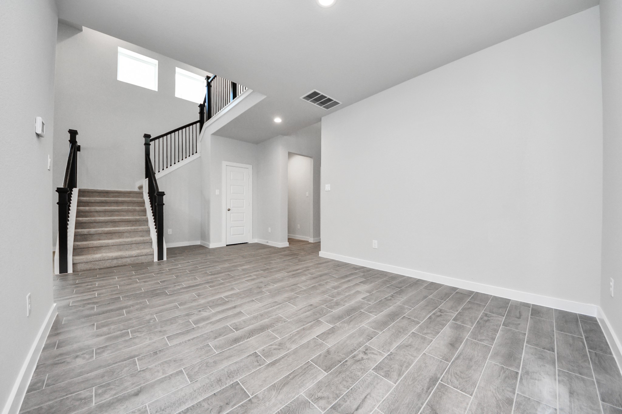 3002 Bury Park Dr Spring Spring, TX 77373 - Photo 10 of 45 a view of empty room with wooden floor