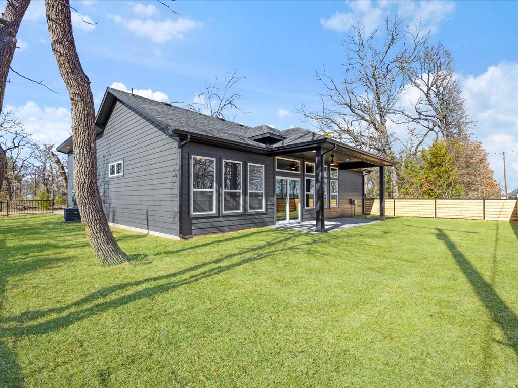 6147 Inca Drive Mabank, TX 75156 - Photo 26 of 38 a view of a house with a backyard