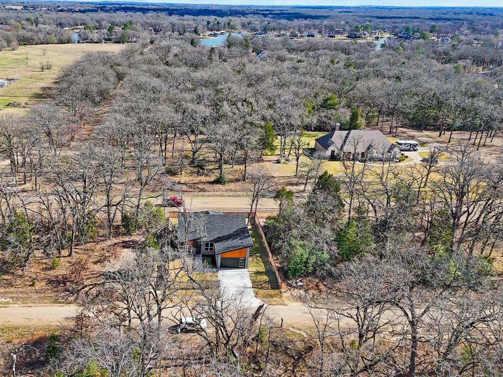 6147 Inca Drive Mabank, TX 75156 - Photo 31 of 38 an aerial view of a house with a yard