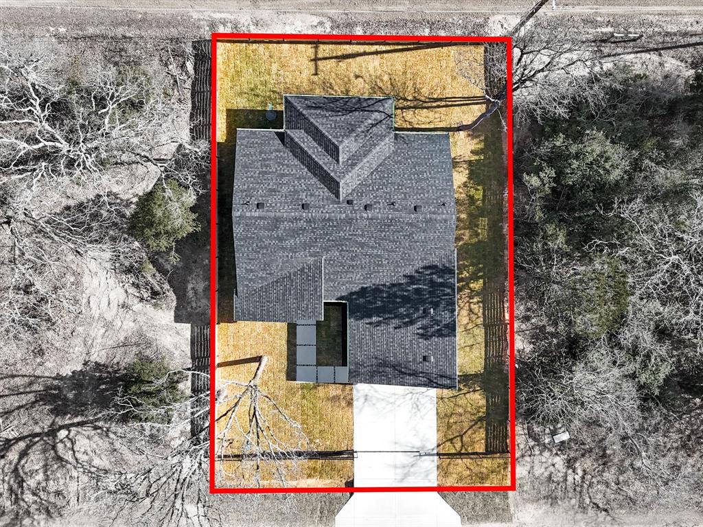 6147 Inca Drive Mabank, TX 75156 - Photo 37 of 38 a view of a wooden door and brick wall