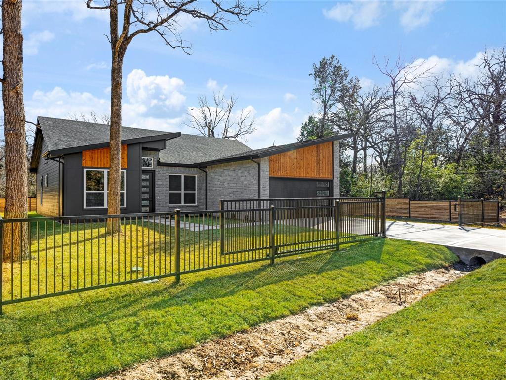 6147 Inca Drive Mabank, TX 75156 - Photo 5 of 38 a view of a house with a backyard