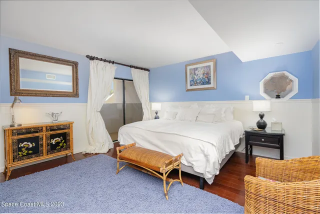 a view of swimming pool with a balcony