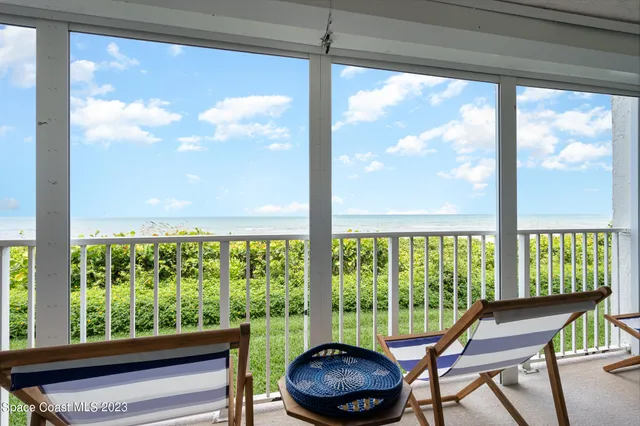 a large kitchen with stainless steel appliances granite countertop a stove and cabinets