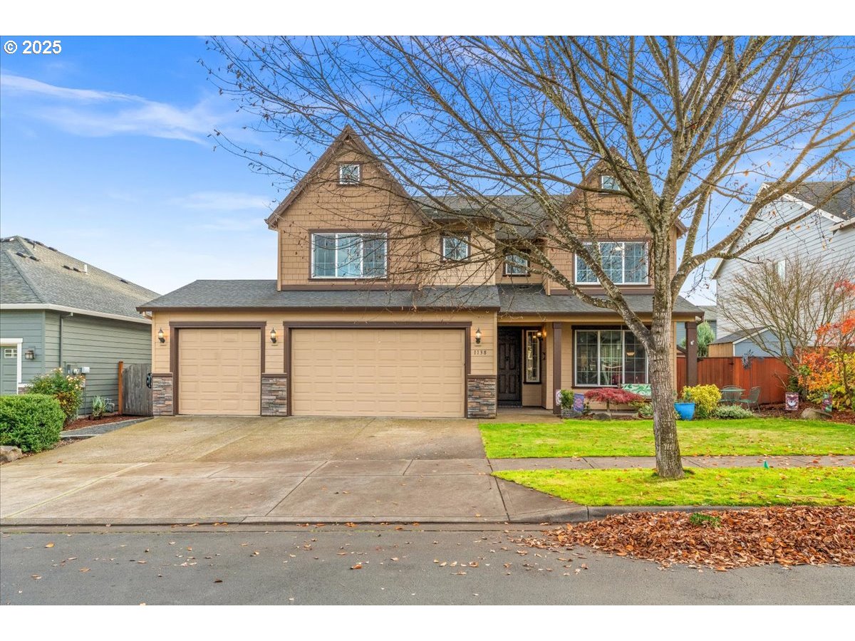 1138 37th Avenue Forest Grove, OR 97116 - Photo 1 of 48 a view of a house with a yard and large tree