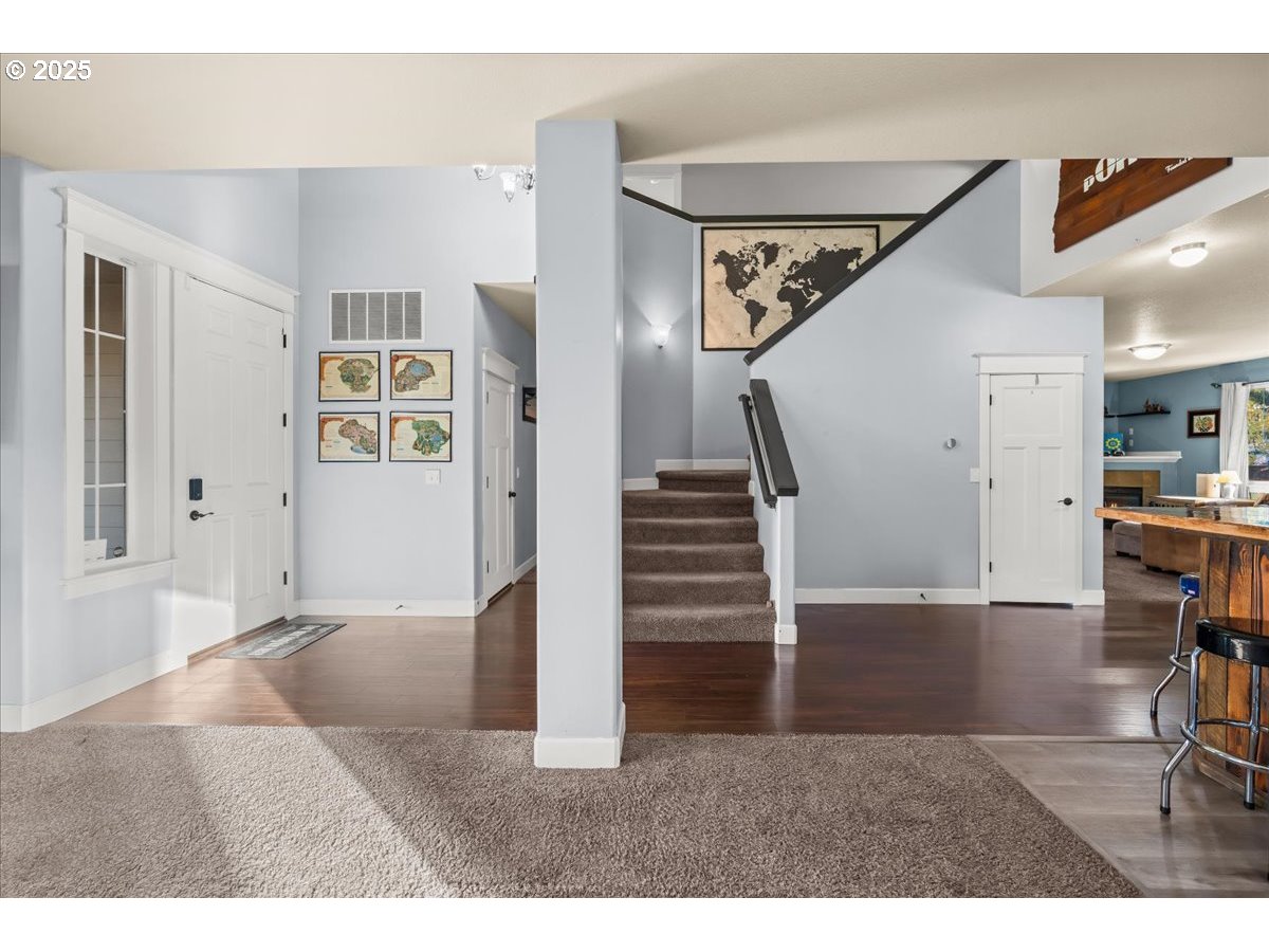 1138 37th Avenue Forest Grove, OR 97116 - Photo 12 of 48 a view of a livingroom with furniture and stairs