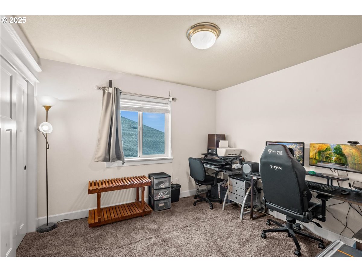 1138 37th Avenue Forest Grove, OR 97116 - Photo 36 of 48 a living room with furniture and a window