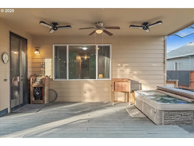 a utility room with a wooden floor