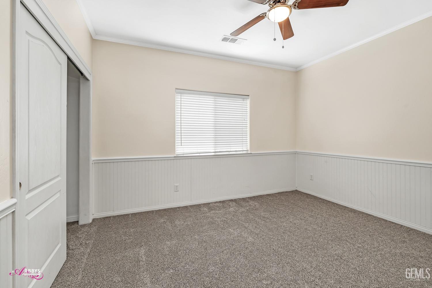 Undisclosed Address Bakersfield, CA 93311 - Photo 27 of 41 an empty room with a empty space and windows