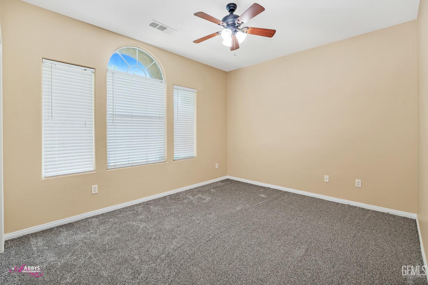 Undisclosed Address Bakersfield, CA 93311 - Photo 28 of 41 a view of an empty room with a window