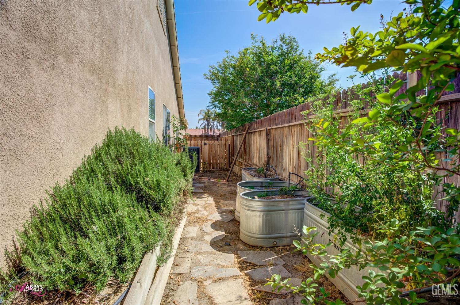 Undisclosed Address Bakersfield, CA 93311 - Photo 38 of 41 a view of a back yard with patio