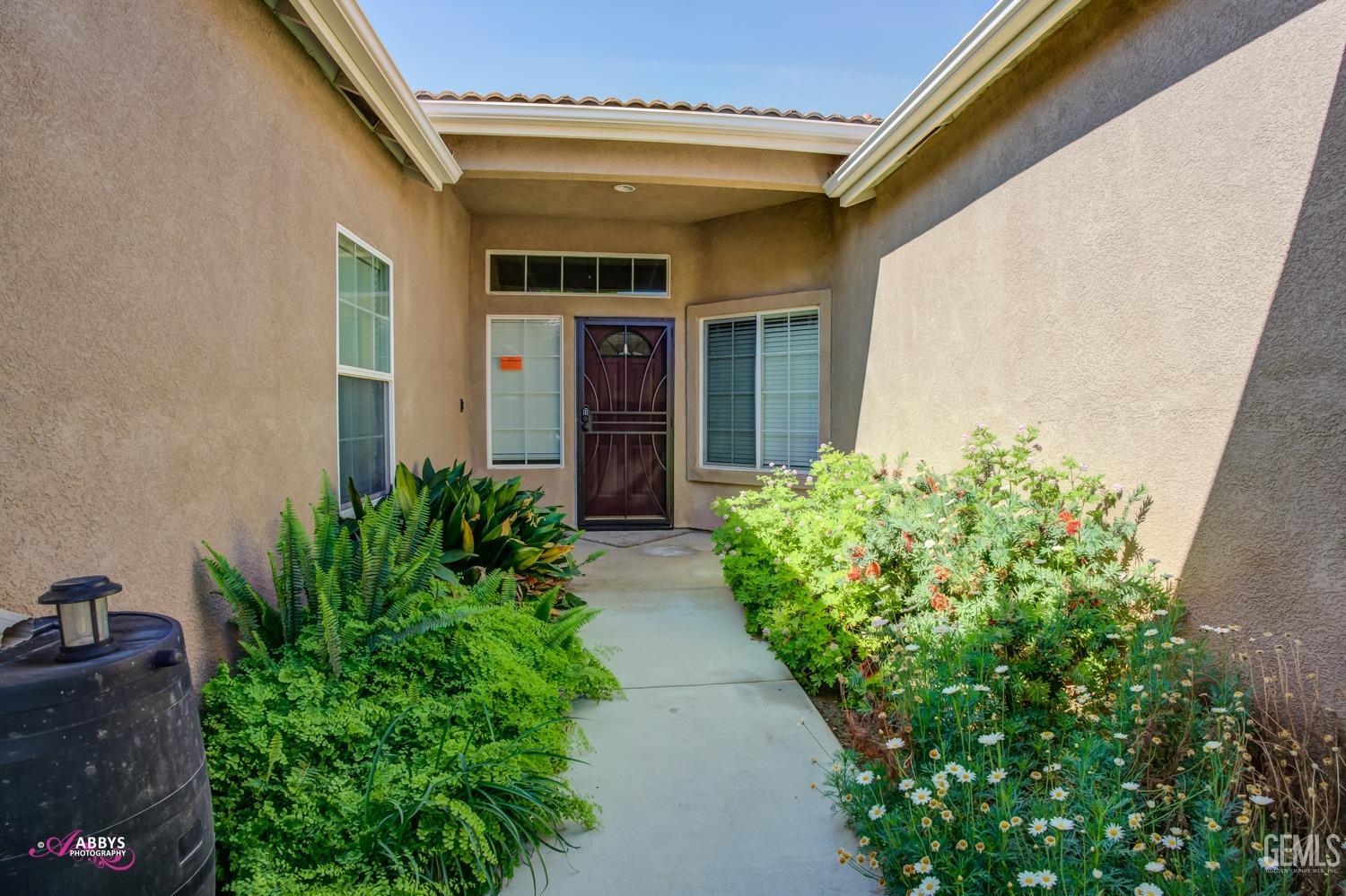 Undisclosed Address Bakersfield, CA 93311 - Photo 8 of 41 a view of the pathway both side of house