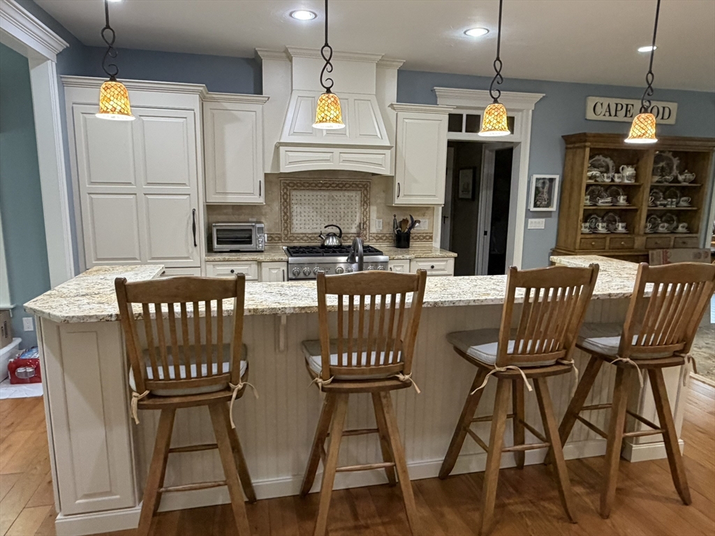 4 Tamarack Lane Sandwich, MA 02563 - Photo 9 of 42 a view of a dining room with furniture