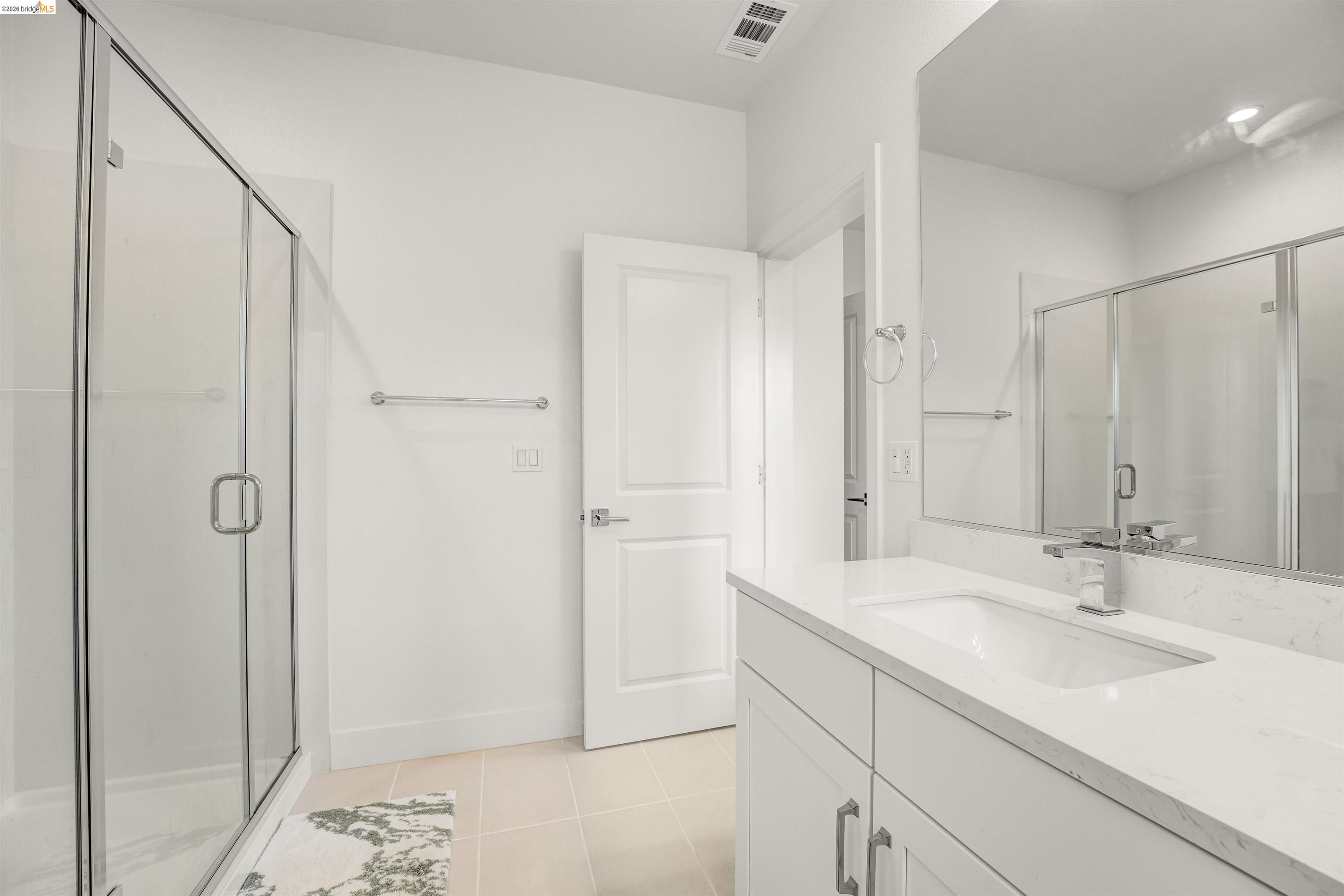 7101 Melon Court San Ramon, CA 94583 - Photo 49 of 58 a bathroom with a sink and a mirror