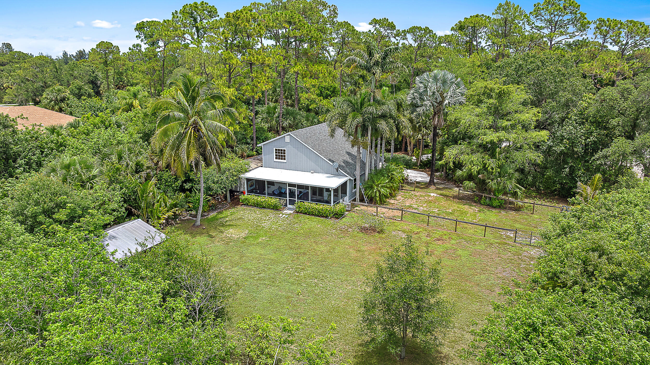15629 95th Avenue North Jupiter, FL 33478 - Photo 5 of 25 a view of a house with a yard