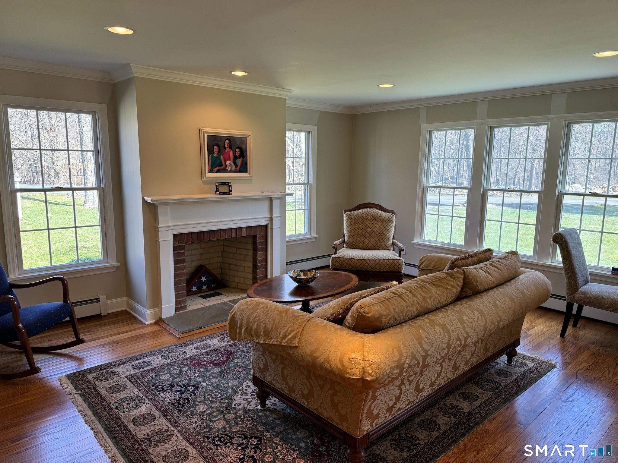 11 Van Campen Lane Bethel, CT 06801 - Photo 24 of 40 Formal living room with fireplace.