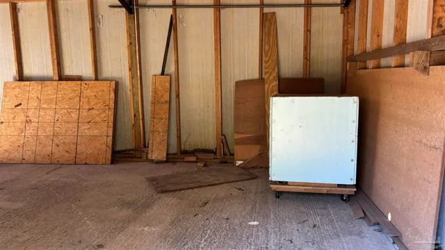 a view of a backyard with large trees