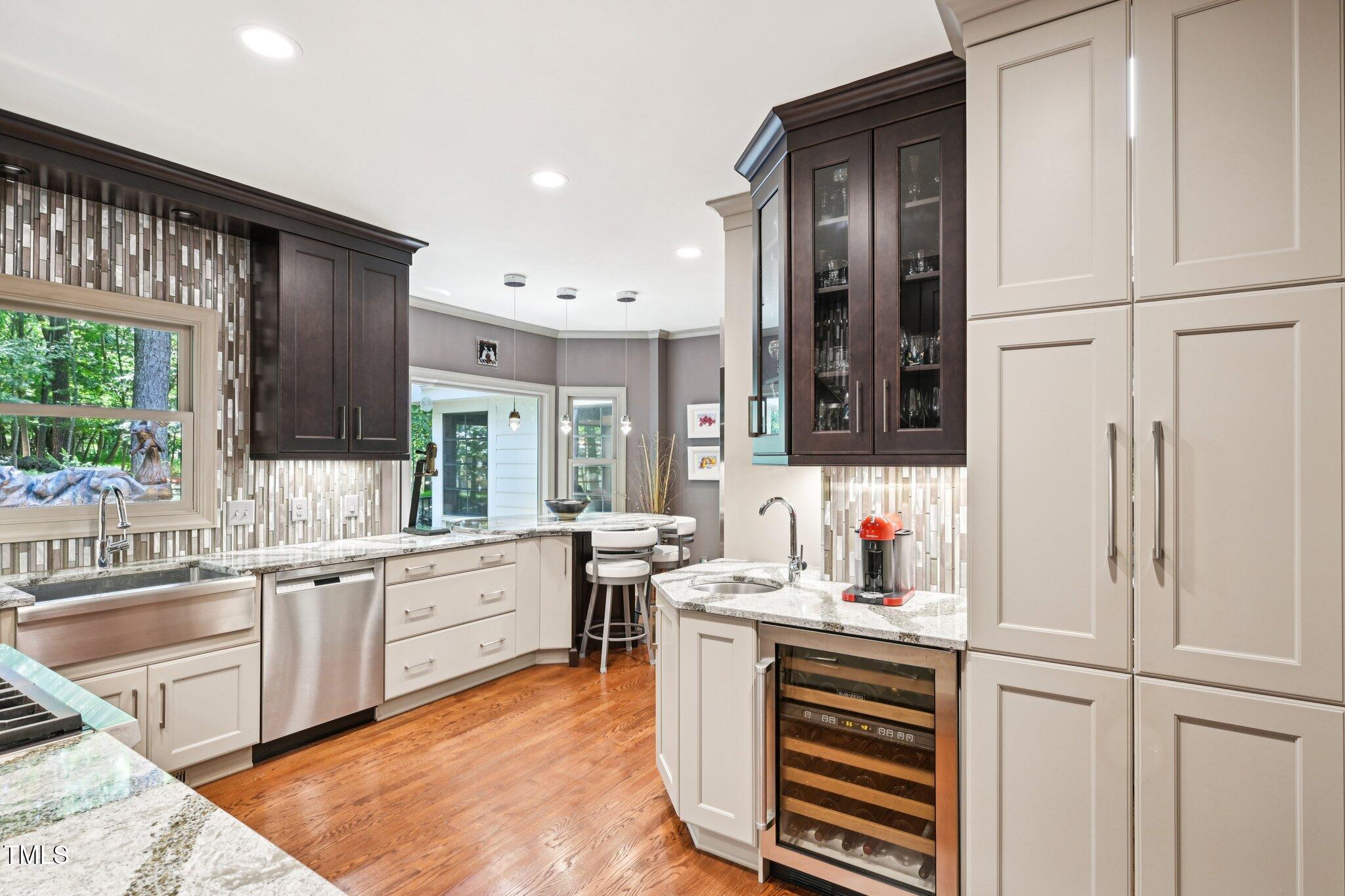 3413 1st Place Raleigh, NC 27613 - Photo 17 of 43 a kitchen with a sink stove and cabinets
