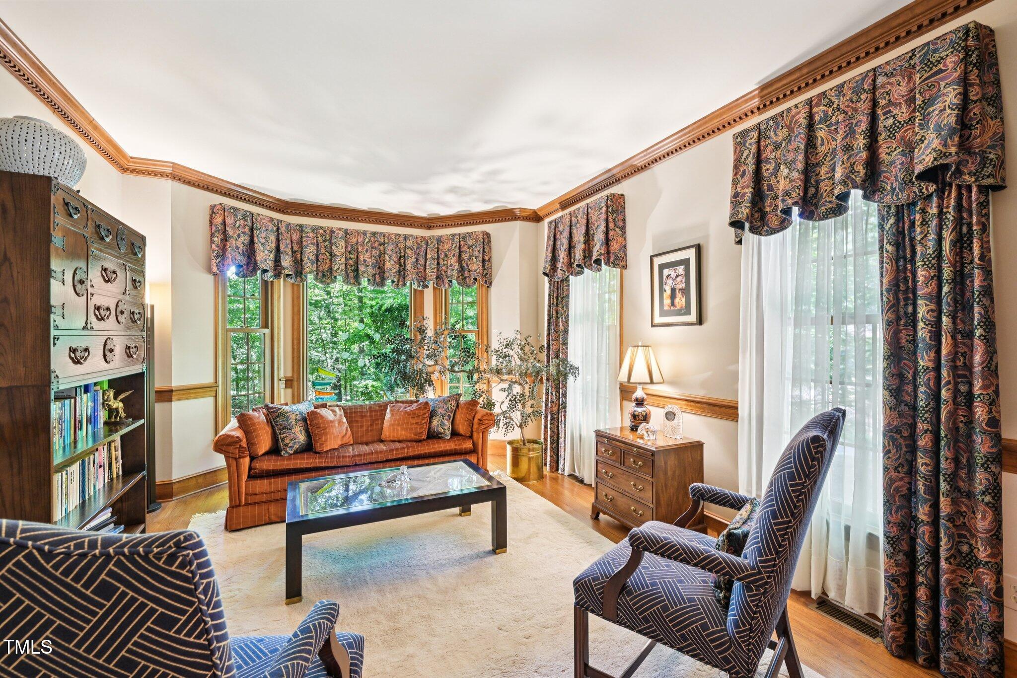 3413 1st Place Raleigh, NC 27613 - Photo 20 of 43 a living room with furniture and a window
