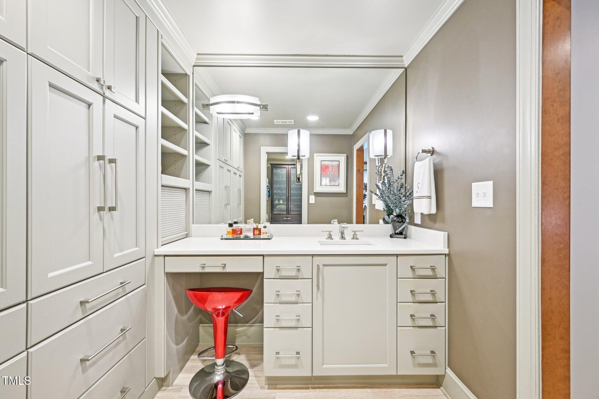 3413 1st Place Raleigh, NC 27613 - Photo 26 of 43 a utility room with cabinets washer and dryer