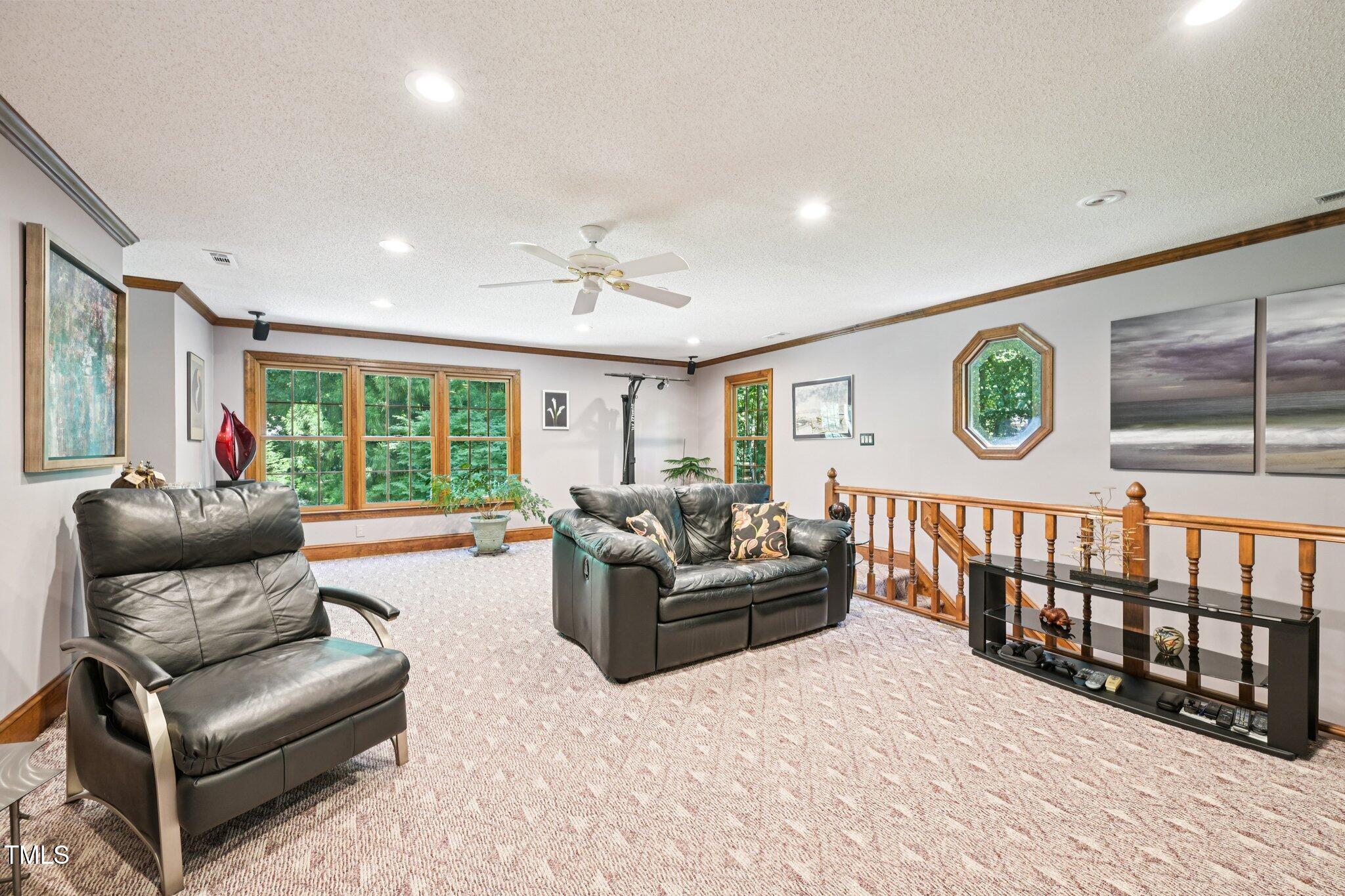 3413 1st Place Raleigh, NC 27613 - Photo 35 of 43 a living room with furniture and a large window