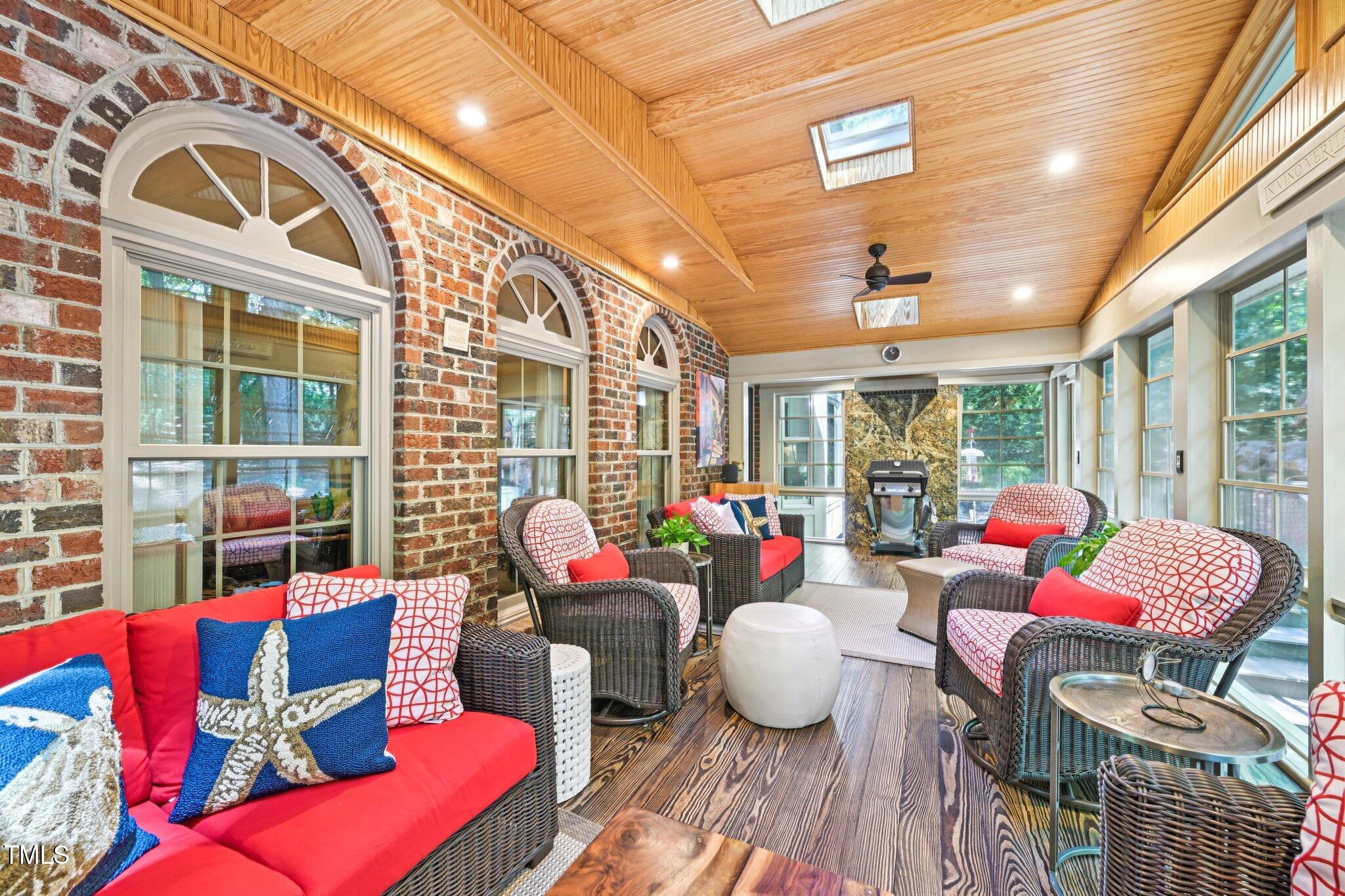 3413 1st Place Raleigh, NC 27613 - Photo 40 of 43 a living room with furniture and a large window