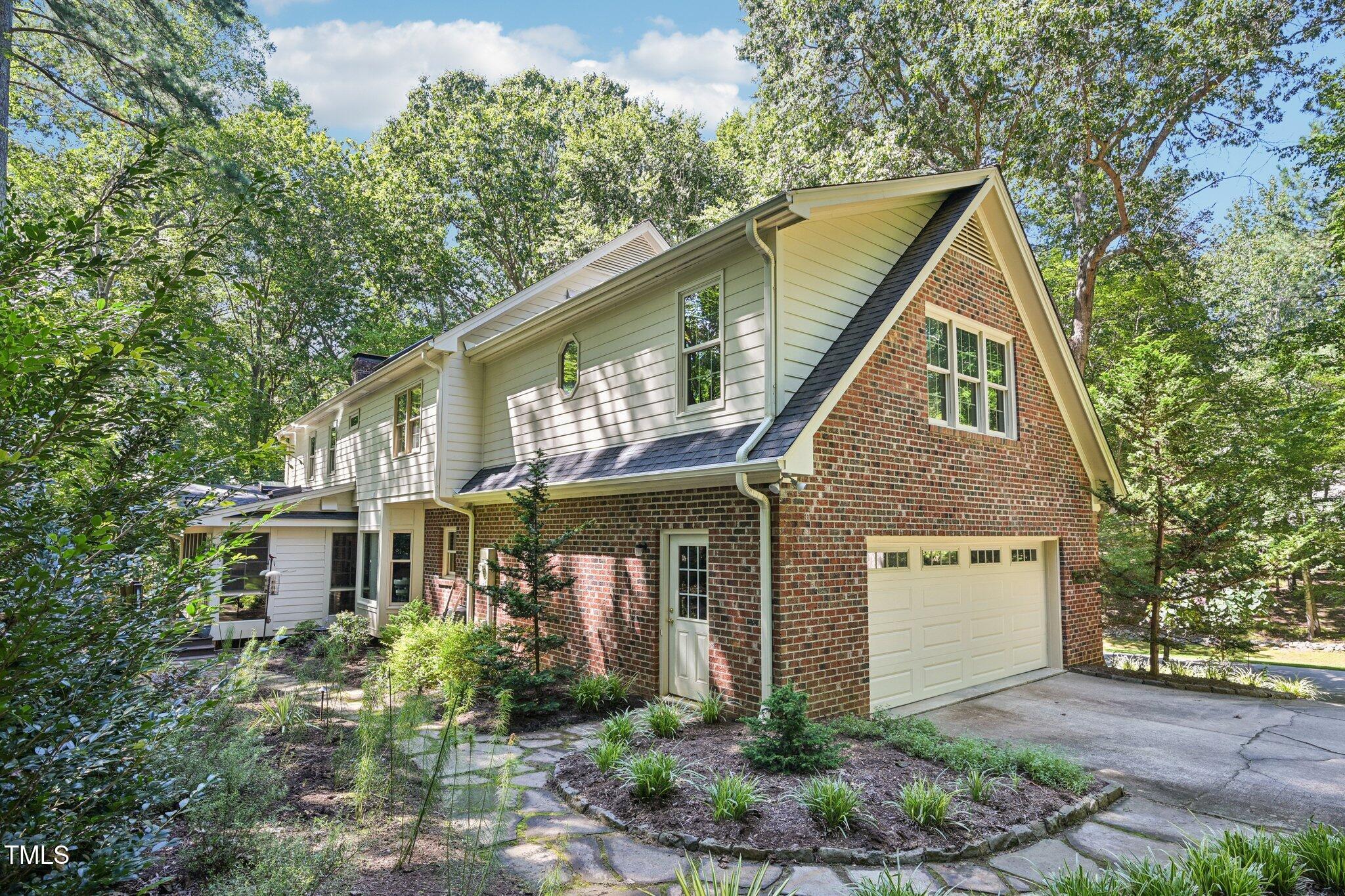 3413 1st Place Raleigh, NC 27613 - Photo 41 of 43 a front view of house with yard and green space