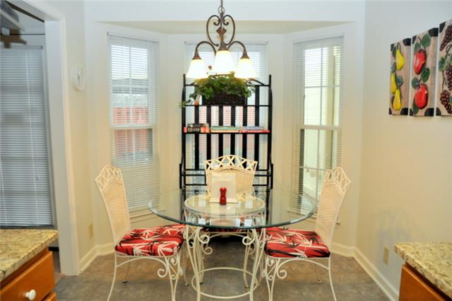 1301 General George Patton Road Nashville, TN 37221 - Photo 3 of 10 a living room with furniture and a window