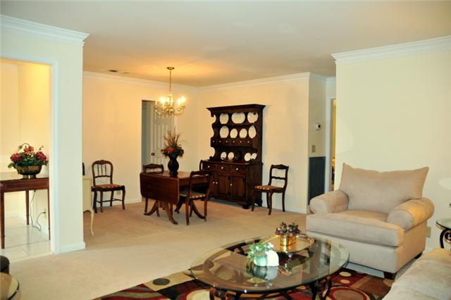 1301 General George Patton Road Nashville, TN 37221 - Photo 4 of 10 a living room with furniture and wooden floor