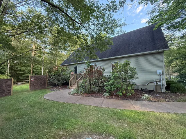 a view of a back yard of the house