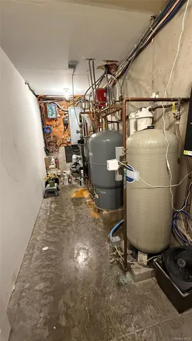 a room with gym equipment and windows