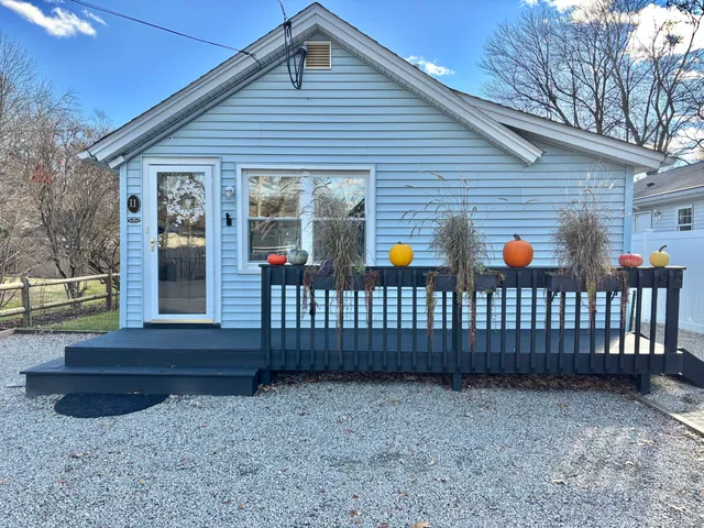 a front view of a house having yard