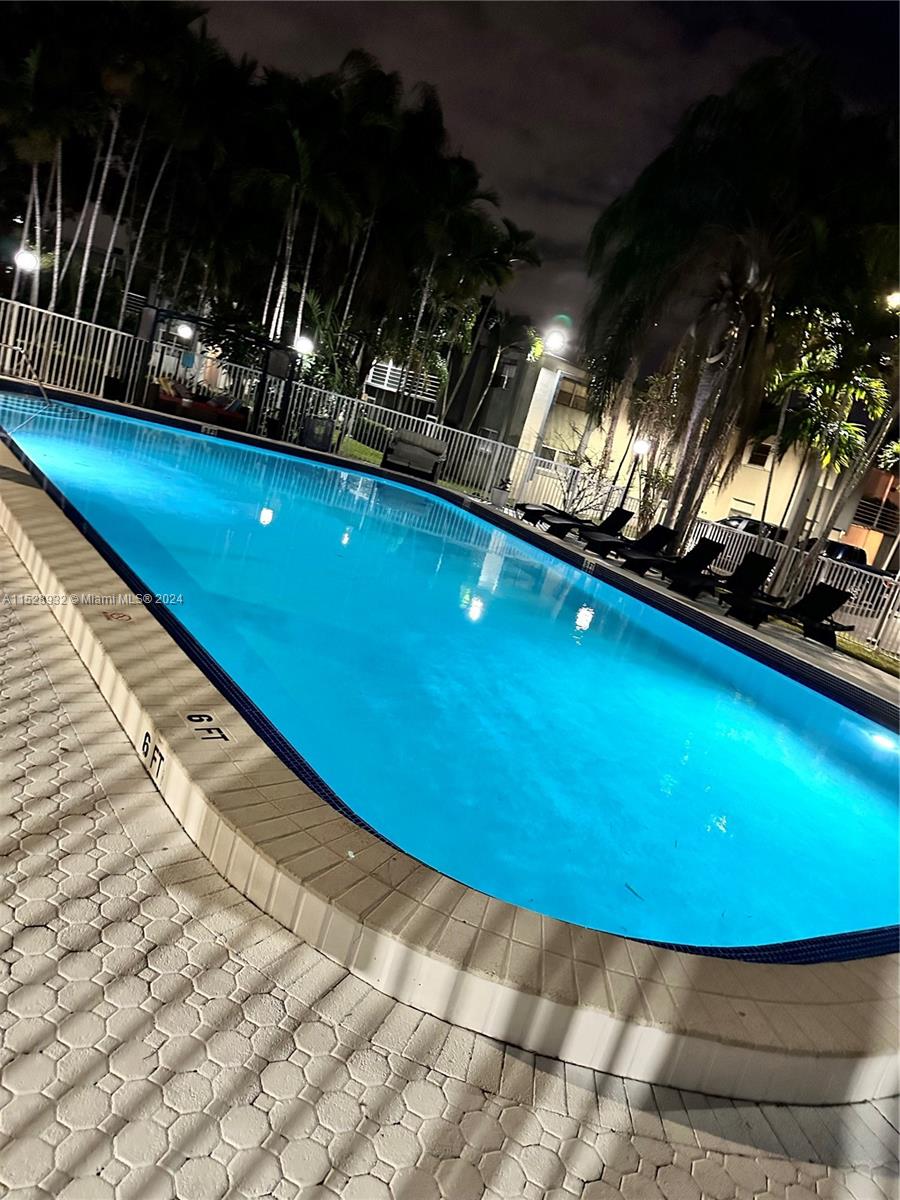 8794 Southwest 12th Street, Unit 108 Miami, FL 33174 - Photo 3 of 7 a view of an indoor swimming pool