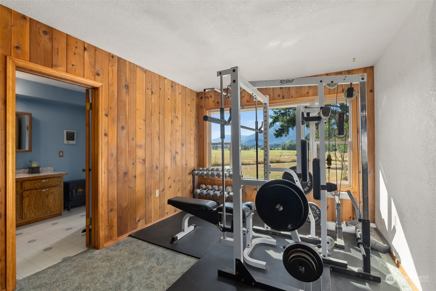 434 Cispus Road Randle, WA 98377 - Photo 13 of 40 a view of a bedroom with washer and dryer