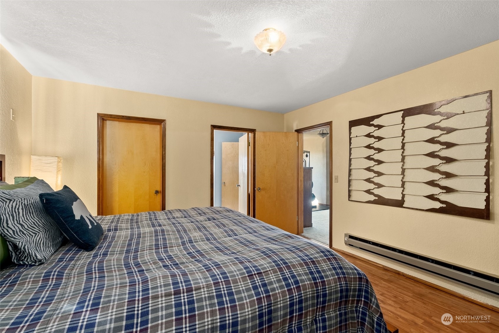 434 Cispus Road Randle, WA 98377 - Photo 15 of 40 a bedroom with a bed and a window