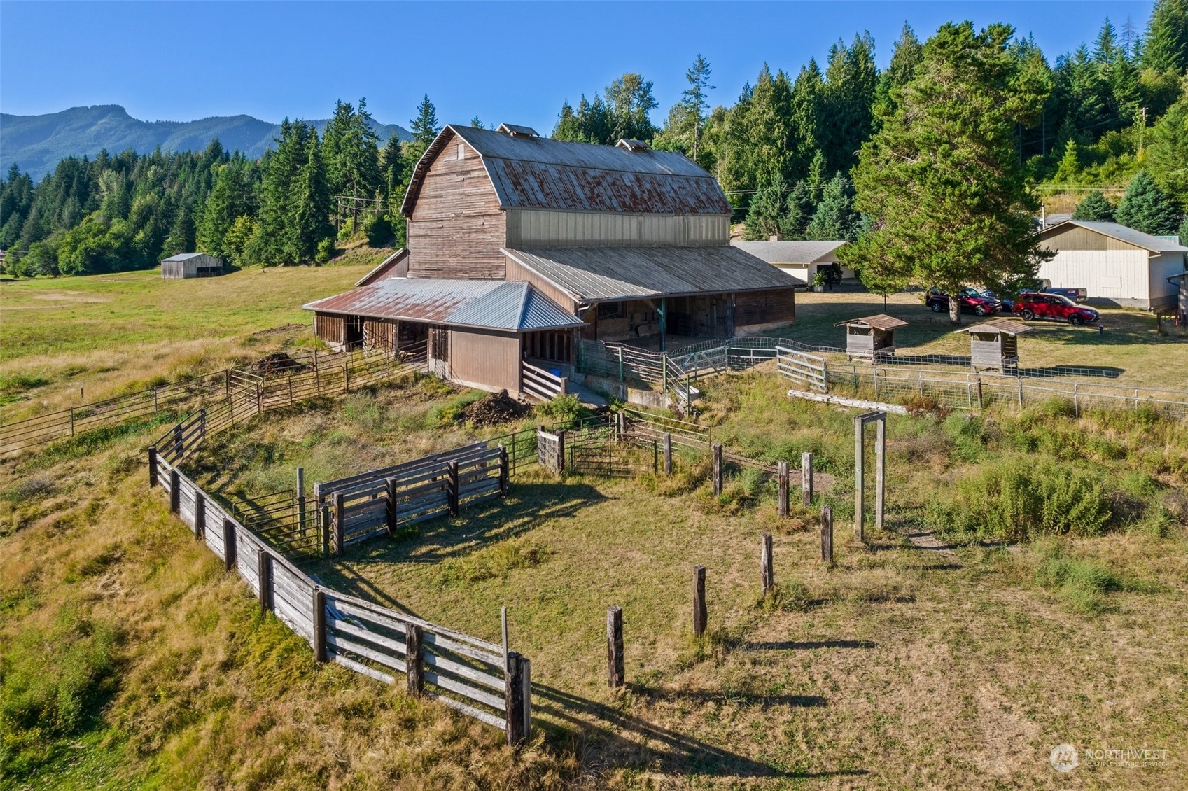 434 Cispus Road Randle, WA 98377 - Photo 27 of 40 a view of a patio with table and chairs and potted plants