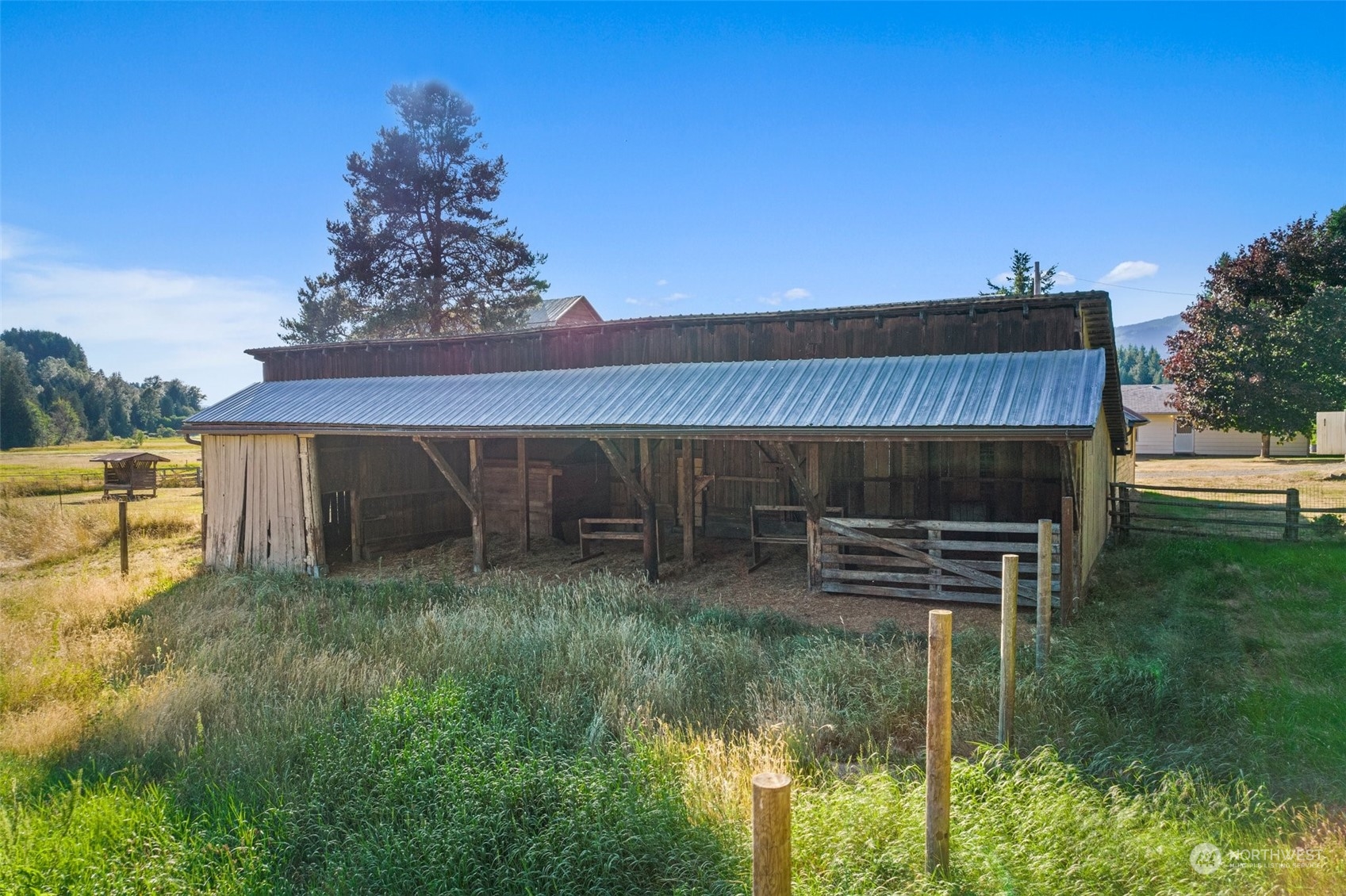 434 Cispus Road Randle, WA 98377 - Photo 29 of 40 a backyard of a house with table and chairs
