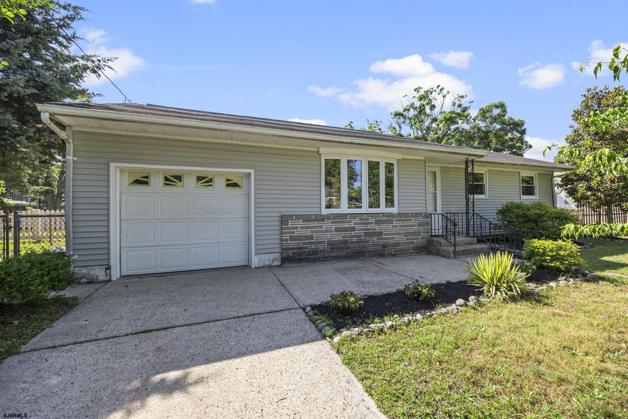 121 Osborne Road Somers Point, NJ 08244 - Photo 2 of 28 front view of a house