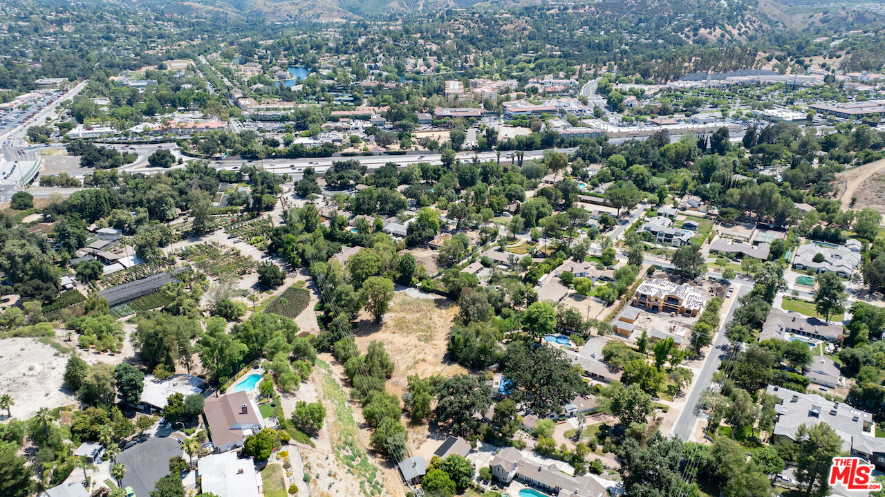 23621 Long Valley Road Hidden Hills, CA 91302 - Photo 13 of 26 an aerial view of residential houses with city view