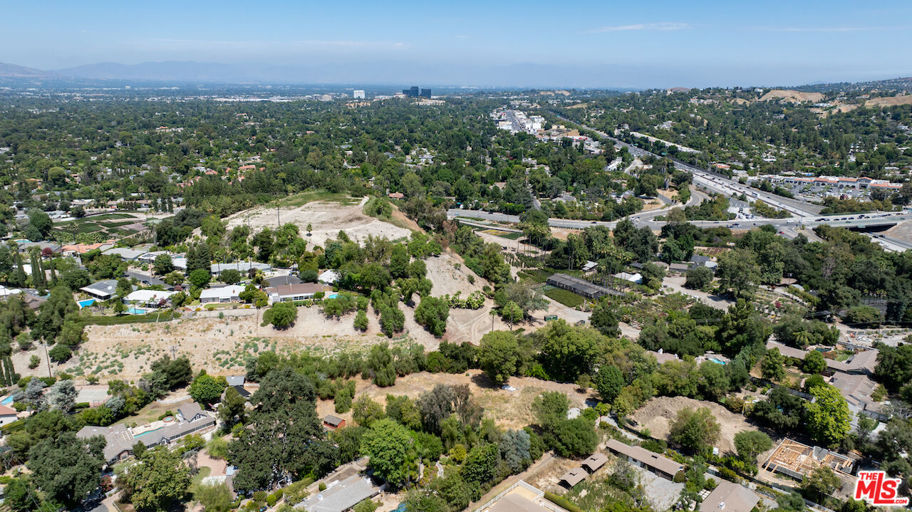 23621 Long Valley Road Hidden Hills, CA 91302 - Photo 15 of 26 an aerial view of a city with lots of residential buildings