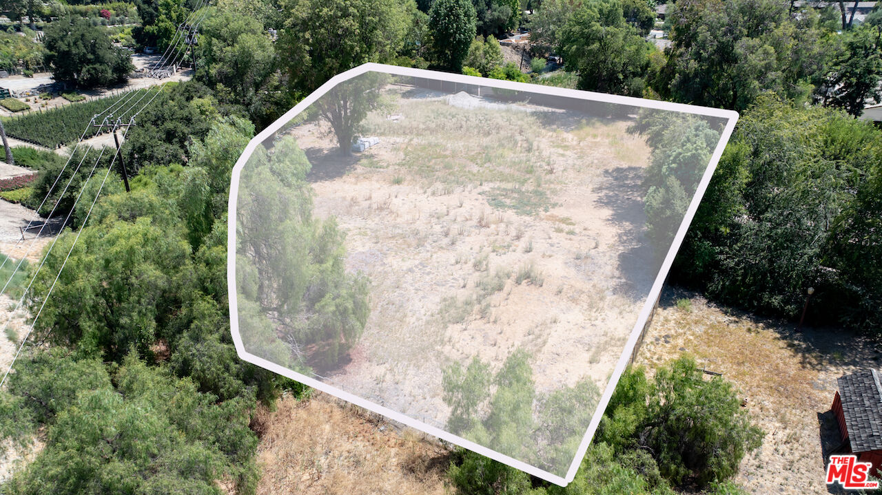 23621 Long Valley Road Hidden Hills, CA 91302 - Photo 22 of 26 an aerial view of a house with a yard