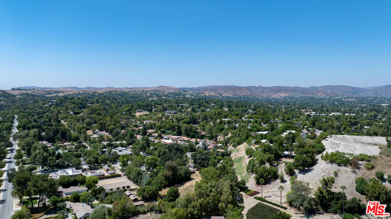 23621 Long Valley Road Hidden Hills, CA 91302 - Photo 24 of 26 an aerial view of a city and mountain view
