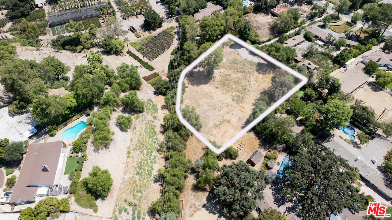 23621 Long Valley Road Hidden Hills, CA 91302 - Photo 6 of 26 an aerial view of house with yard